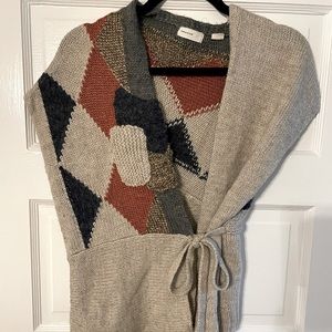 Anthropologie top-brand sleeping on snow.